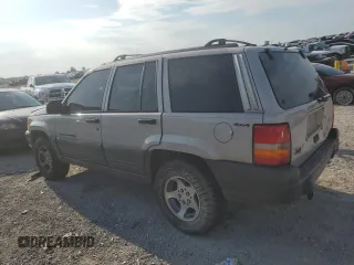 1998 Jeep Grand Cherokee Laredo with VIN 1J4GZ58S8WC301754, listed as a Copart auction lot 69698144 with 205,739 mi miles and Non Repairable. Bid and sale history available at carsss.com. Image 2.
