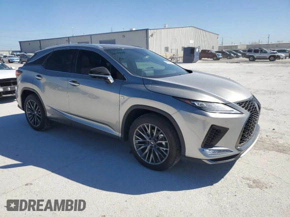 2022 Lexus RX with VIN 2T2YGMDA5NC091817, listed as a Copart auction lot 49316305 with 14,215 mi miles and Salvage Title. Bid and sale history available at carsss.com. Image 4.