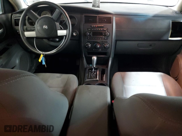 2005 Dodge Magnum z VIN 2D4FV48T75H515245, wystawiony jako Copart lot #88523005 z przebiegiem 150 158 mil mil oraz Szkody całkowita. Historia ofert i sprzedaży dostępna na DreamBid. Obrazek 8.