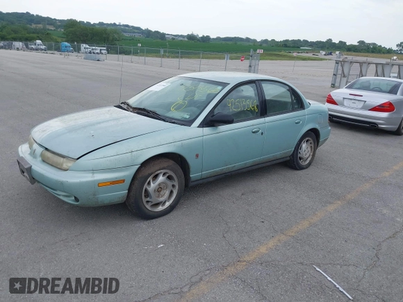 1996 Saturn SL with VIN 1G8ZK5277TZ340863, listed as a IAAI auction lot 42513568 with 130,286 mi miles and . Bid and sale history available at DreamBid. Image 2.