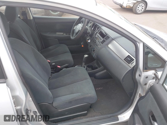 2010 Nissan Versa S with VIN 3N1BC1CP3AL401077, listed as a IAAI auction lot 41948146 with 98,394 mi miles and . Bid and sale history available at DreamBid. Image 5.