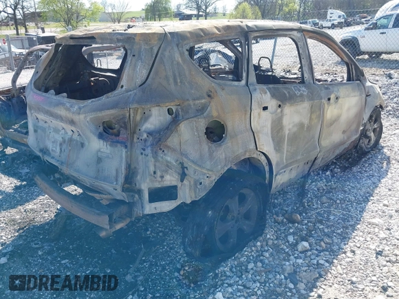2016 Ford Escape SE with VIN 1FMCU9GX6GUC82782, listed as a IAAI auction lot 41938368 with Not Provided miles and . Bid and sale history available at DreamBid. Image 4.
