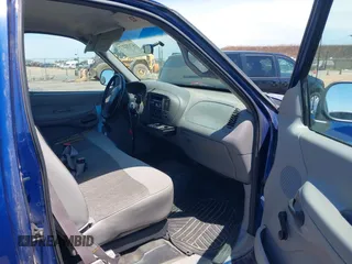1998 Ford F-150 with VIN 1FTZX1728WKA58760, listed as a IAAI auction lot 42832277 with 189,085 mi miles and . Bid and sale history available at DreamBid. Image 5.