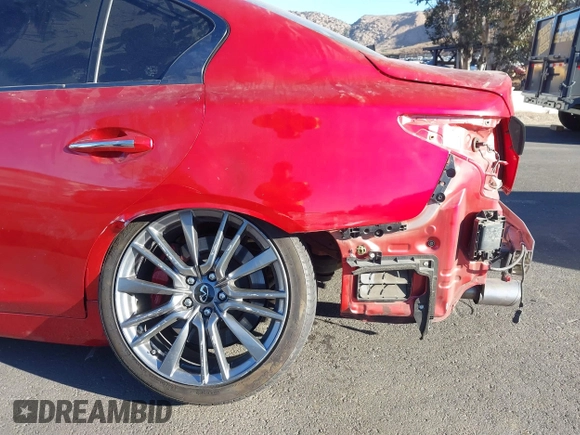 2021 Infiniti Q50 Red Sport 400 with VIN JN1FV7DP3MM850783, listed as a IAAI auction lot 41335175 with 59,113 mi miles and . Bid and sale history available at DreamBid. Image 18.