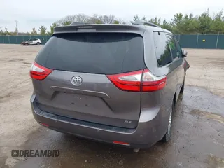 2015 Toyota Sienna XLE with VIN 5TDYK3DC8FS651580, listed as a IAAI auction lot 41971867 with 49,711 mi miles. Bid and sale history available at carsss.com. Image 4.