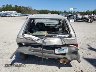 1990 Geo Metro z VIN 2C1MR2466L6018173, wystawiony jako Copart lot #72966054 z przebiegiem 88 980 mil mil oraz Szkody całkowita. Historia ofert i sprzedaży dostępna na DreamBid. Obrazek 6.