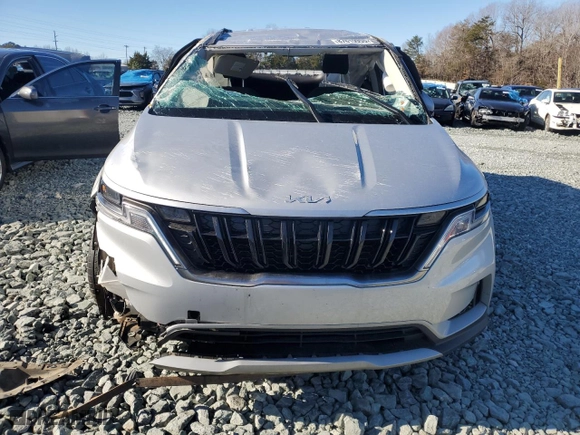2023 Kia Carnival LX with VIN KNDNB4H35P6254056, listed as a Copart auction lot 87619955 with 0 mi miles and Salvage Title. Bid and sale history available at carsss.com. Image 5.