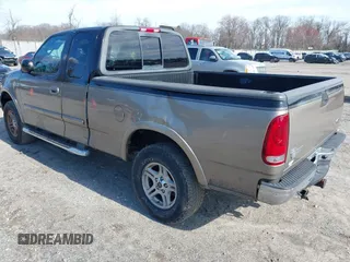 2003 Ford F-150 XL with VIN 1FTRX18L53NB01663, listed as a IAAI auction lot 41887655 with 177,914 mi miles. Bid and sale history available at carsss.com. Image 3.