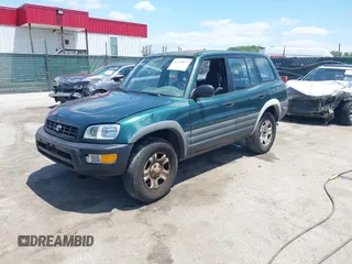 1998 Toyota RAV4 with VIN JT3GP10V6W0023680, listed as a IAAI auction lot 42235877 with 244,446 mi miles and . Bid and sale history available at DreamBid. Image 17.