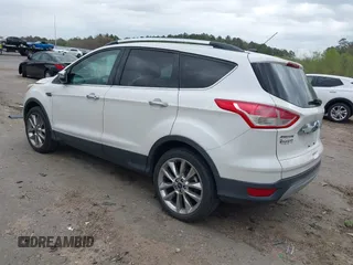 2016 Ford Escape SE with VIN 1FMCU0GX0GUA95789, listed as a IAAI auction lot 41829818 with 84,431 mi miles. Bid and sale history available at carsss.com. Image 3.