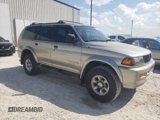 1999 Mitsubishi Montero LS z VIN JA4LS31H8XP026225, wystawiony jako Copart lot #71874604 z przebiegiem 243 182 mil mil oraz Szkody całkowita. Historia ofert i sprzedaży dostępna na DreamBid. Obrazek 4.