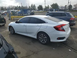 2017 Honda Civic EX z VIN 19XFC2F7XHE209024, wystawiony jako Copart lot #48227055 z przebiegiem 66 661 mil mil oraz Szkody całkowita. Historia ofert i sprzedaży dostępna na DreamBid. Obrazek 2.