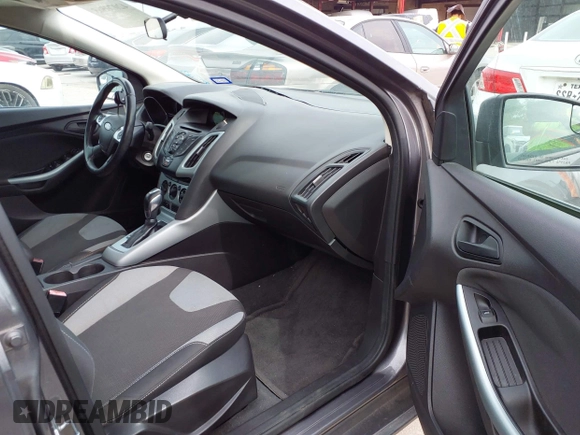 2012 Ford Focus SE with VIN 1FAHP3F25CL122340, listed as a IAAI auction lot 42070565 with 186,662 mi miles. Bid and sale history available at carsss.com. Image 5.