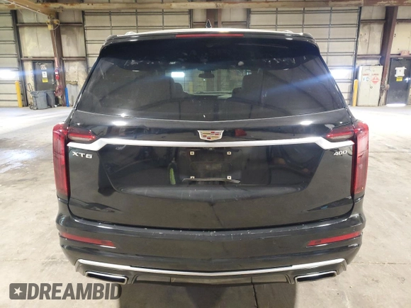 2020 Cadillac XT6 FWD Premium Luxury with VIN 1GYKPCRSXLZ154638, listed as a Copart auction lot 57439835 with 142,435 mi miles and Salvage title. Bid and sale history available at DreamBid. Image 6.
