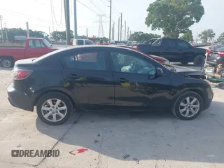 2011 Mazda 3 i Touring z VIN JM1BL1VG7B1362187, wystawiony jako IAAI lot #42210831 z przebiegiem 124 195 mil mil oraz . Historia ofert i sprzedaży dostępna na DreamBid. Obrazek 13.