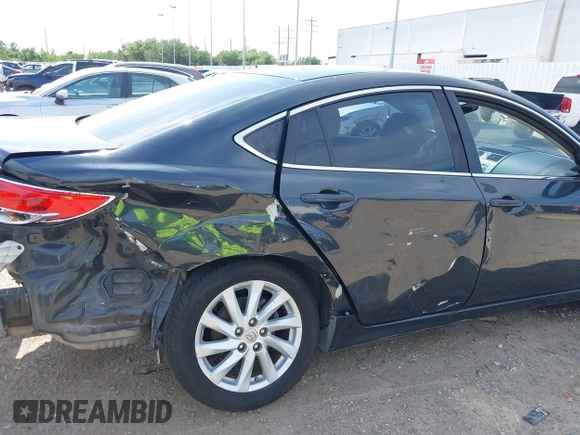 2012 Mazda 6 i Touring with VIN 1YVHZ8DH7C5M29077, listed as a IAAI auction lot 42236370 with 193,258 mi miles and . Bid and sale history available at DreamBid. Image 18.
