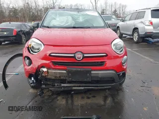 2021 FIAT 500X Trekking z VIN ZFBNF3B17MP944728, wystawiony jako IAAI lot #41460442 z przebiegiem 27 574 mil mil oraz . Historia ofert i sprzedaży dostępna na DreamBid. Obrazek 13.