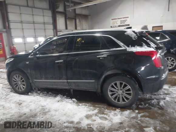 2018 Cadillac XT5 Luxury AWD with VIN 1GYKNDRSXJZ182299, listed as a IAAI auction lot 41628039 with 124,054 mi miles and . Bid and sale history available at DreamBid. Image 14.