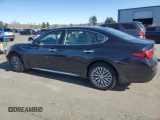2015 Infiniti Q70 z VIN JN1BY1PR9FM830573, wystawiony jako Copart lot #48071215 z przebiegiem 57 378 mil mil oraz Szkoda całkowita • Salvage title. Historia ofert i sprzedaży dostępna na DreamBid. Obrazek 2.