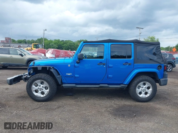 2015 Jeep Wrangler Unlimited Sahara with VIN 1C4BJWEG4FL677879, listed as a IAAI auction lot 42676097 with 85,821 mi miles and . Bid and sale history available at DreamBid. Image 14.