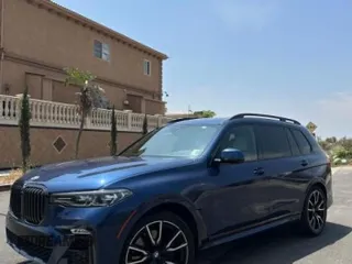 2020 BMW X7 xDrive40i z VIN 5UXCW2C06L0E74740, wystawiony jako Copart lot #55679695 z przebiegiem 21 686 mil mil oraz Szkody całkowita. Historia ofert i sprzedaży dostępna na DreamBid. Obrazek 2.