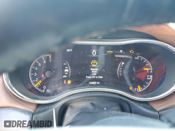 2015 Jeep Grand Cherokee Summit with VIN 1C4RJFJG0FC700014, listed as a Copart auction lot 42981765 with 144,937 mi miles and Salvage Title. Bid and sale history available at DreamBid. Image 9.
