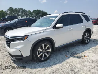 2023 Honda Pilot Touring with VIN 5FNYG2H77PB014212, listed as a Copart auction lot 59222715 with 4,507 mi miles and Salvage title. Bid and sale history available at DreamBid. Image 1.