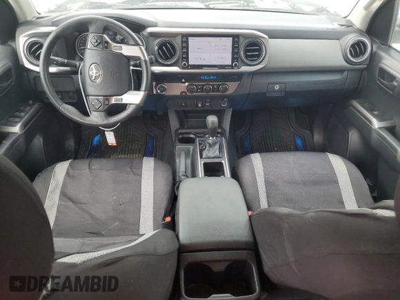 2023 Toyota Tacoma SR5 z VIN 3TMAZ5CN2PM209813, wystawiony jako Copart lot #53946645 z przebiegiem 23 411 mil mil oraz Szkody całkowita. Historia ofert i sprzedaży dostępna na DreamBid. Obrazek 8.