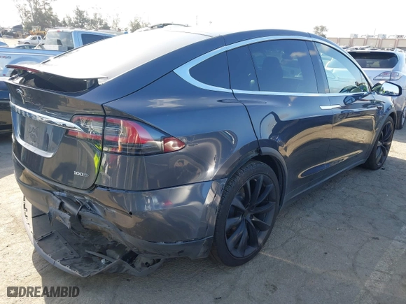 2018 Tesla Model X 75D with VIN 5YJXCBE22JF124270, listed as a IAAI auction lot 41909734 with 92,553 mi miles. Bid and sale history available at carsss.com. Image 4.