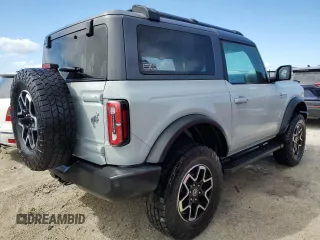 2021 Ford Bronco z VIN 1FMDE5CP4MLA65927, wystawiony jako Copart lot #74809974 z przebiegiem 41 296 mil mil oraz Nie do naprawy • Non repairable. Historia ofert i sprzedaży dostępna na DreamBid. Obrazek 3.