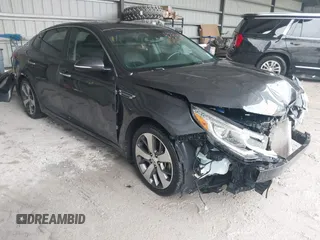 2019 Kia Optima LX z VIN 5XXGT4L35KG314960, wystawiony jako IAAI lot #42212868 z przebiegiem 113 920 mil mil oraz . Historia ofert i sprzedaży dostępna na DreamBid. Obrazek 1.