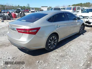2018 Toyota Avalon XLE with VIN 4T1BK1EB9JU283488, listed as a IAAI auction lot 41777239 with 97,893 mi miles and . Bid and sale history available at DreamBid. Image 4.