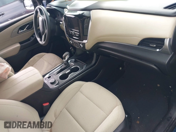 2023 Chevrolet Traverse LS with VIN 1GNERFKW5PJ115835, listed as a IAAI auction lot 42596841 with 32,937 mi miles and . Bid and sale history available at DreamBid. Image 5.