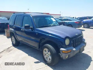 2004 Jeep Liberty Sport with VIN 1J4GK48KX4W241129, listed as a IAAI auction lot 41980258 with 259,048 mi miles and . Bid and sale history available at carsss.com. Image 1.