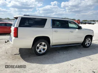 2015 Chevrolet Suburban LTZ with VIN 1GNSKKKC6FR119849, listed as a Copart auction lot 47176815 with 67,235 mi miles and Salvage Title. Bid and sale history available at carsss.com. Image 3.