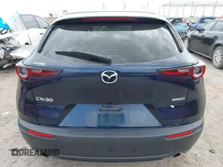 2021 Mazda CX-30 S with VIN 3MVDMAAL4MM302042, listed as a IAAI auction lot 42288275 with 39,821 mi miles and . Bid and sale history available at DreamBid. Image 17.