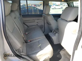2006 Jeep Commander Limited z VIN 1J8HH58N46C125639, wystawiony jako Copart lot #74521154 z przebiegiem 276 411 mil mil oraz Szkoda całkowita • Salvage title. Historia ofert i sprzedaży dostępna na DreamBid. Obrazek 11.