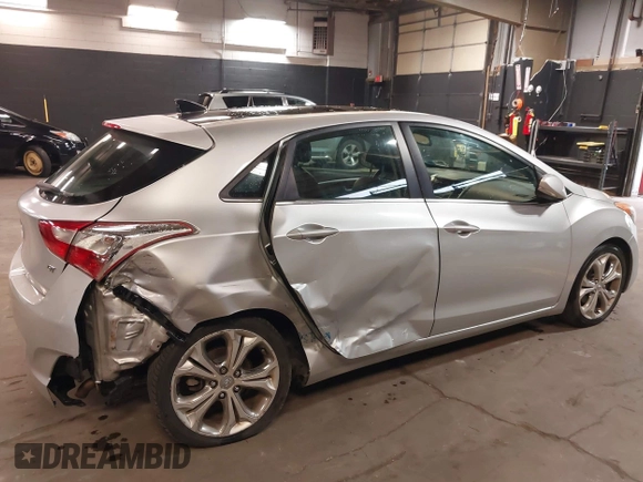 2013 Hyundai Elantra GT with VIN KMHD35LE2DU105677, listed as a IAAI auction lot 42027623 with 137,063 mi miles. Bid and sale history available at carsss.com. Image 6.