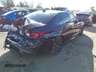 2023 BMW 5 Series 540i with VIN WBA53BJ06PWY11037, listed as a IAAI auction lot 41612304 with 37,274 mi miles and . Bid and sale history available at DreamBid. Image 4.