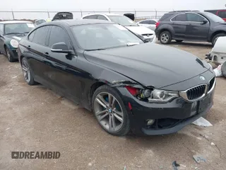 2015 BMW 4 Series 428i z VIN WBA4A9C54FD416870, wystawiony jako IAAI lot #41593977 z przebiegiem 99 314 mil mil oraz . Historia ofert i sprzedaży dostępna na DreamBid. Obrazek 1.