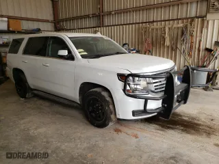 2020 Chevrolet Tahoe Commercial with VIN 1GNSKDEC5LR287842, listed as a Copart auction lot 63522994 with 142,508 mi miles and Salvage Title. Bid and sale history available at carsss.com. Image 4.