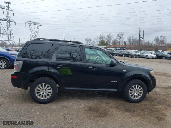 2009 Mercury Mariner Hybrid with VIN 4M2CU29359KJ09642, listed as a IAAI auction lot 41734762 with 233,989 mi miles. Bid and sale history available at carsss.com. Image 13.