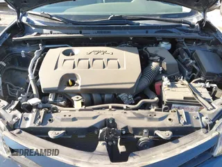 2019 Toyota Corolla L with VIN 5YFBURHE7KP922064, listed as a IAAI auction lot 41977741 with 54,896 mi miles and . Bid and sale history available at DreamBid. Image 10.