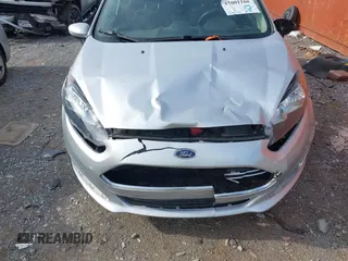 2014 Ford Fiesta SE with VIN 3FADP4EJ0EM215958, listed as a IAAI auction lot 42001168 with 115,231 mi miles and . Bid and sale history available at DreamBid. Image 6.