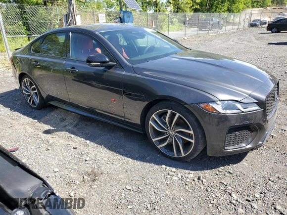 2024 Jaguar XF with VIN SAJB64FXXRCY94427, listed as a Copart auction lot 57876855 with 5,885 mi miles and Salvage title. Bid and sale history available at DreamBid. Image 4.