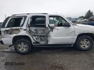 2004 Chevrolet Tahoe LS with VIN 1GNEC13Z94R265831, listed as a IAAI auction lot 41840133 with 176,219 mi miles and . Bid and sale history available at DreamBid. Image 6.