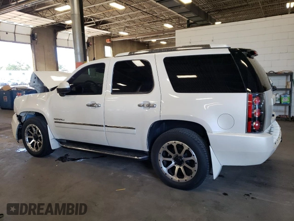 2012 GMC Yukon Denali with VIN 1GKS2EEF3CR140772, listed as a Copart auction lot 69621614 with 207,425 mi miles and Salvage Title. Bid and sale history available at carsss.com. Image 2.