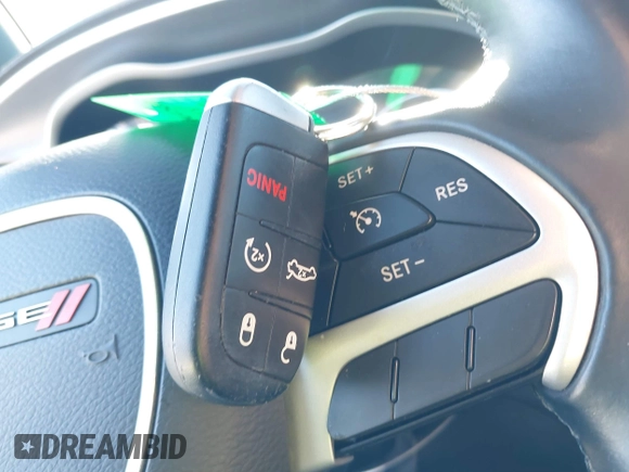 2015 Dodge Charger SXT with VIN 2C3CDXHG5FH841090, listed as a IAAI auction lot 41293591 with 107,732 mi miles and . Bid and sale history available at DreamBid. Image 11.