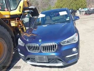 2017 BMW X1 xDrive28i with VIN WBXHT3C33H5F82035, listed as a IAAI auction lot 41944399 with 102,942 mi miles. Bid and sale history available at carsss.com. Image 12.