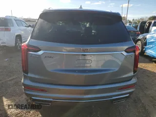 2023 Cadillac XT6 FWD Luxury z VIN 1GYKPAR48PZ115719, wystawiony jako Copart lot #87848435 z przebiegiem 17 597 mil mil oraz Szkoda całkowita • Salvage title. Historia ofert i sprzedaży dostępna na DreamBid. Obrazek 6.